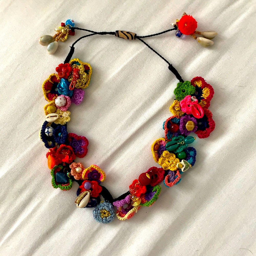 Colorful knit necklace with shells and beads